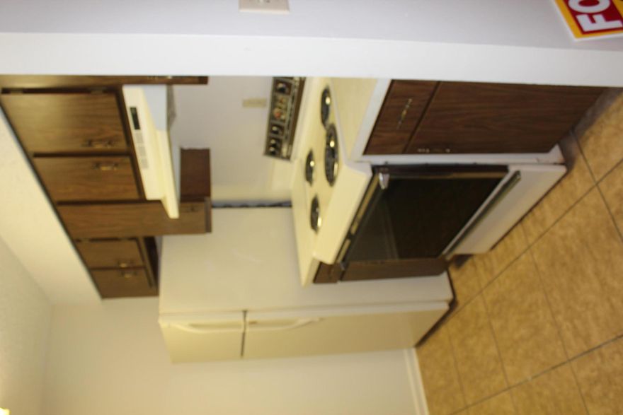 A GREAT 2ND FLOOR, VERY SPACIOUS 1,250SF, WITH OPEN FLOOR PLAN FOR THE LIVING/DINING AREAS, AND A SPLIT BEDROOM SCENARIO AS WELL. THREE BEDROOMS, TWO BATHS, WITH LARGE LIVING ROOM AND DINING AREA. KITCHEN HAS DISHWASHER, REFRIGERATOR, OVEN/RANGE, AND DISPOSAL, WITH LOADS OF CABINET SPACE. THIS UNIT, BEING ON THE BACK SIDE, HAS GREAT PRIVACY, WITH A NICE BALCONY TO ENJOY PEACEFUL DAYS AND EVENINGS. COMMUNITY POOL AND VERY NICE LAUNDRY FACILITIES ARE AVAILABLE FOR YOUR USE AS WELL. ASSOCIATION DUES COVER WATER, SEWAGE, TRASH AND PEST CONTROL, ALONG WITH INSURANCE ON THE BUILDING, EXTERIOR MAINTENANCE, ETC.