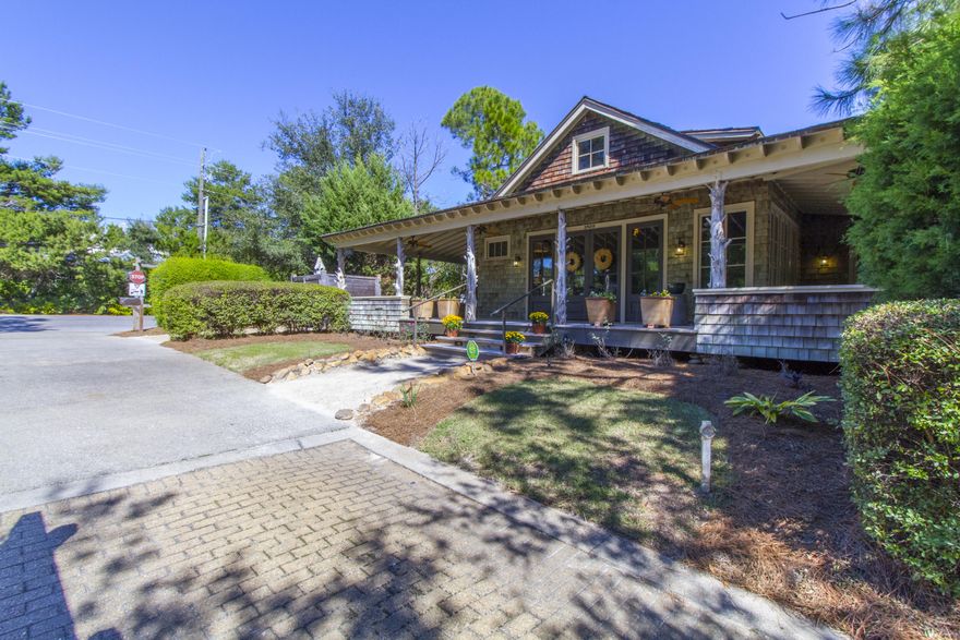 Extremely rare commercial space with frontage on 30A in beautiful Draper Lake. Sitting alongside one of Walton County's beautiful Coastal Dune Lakes, this property has been professionally designed and decorated. Enter the building into a stunning reception area containing a large vaulted ceiling, a huge stone fireplace, and a gorgeous chandelier. Wooden floors, wooden walls, and wooden ceilings showcase the character of the space. The property also features an amazing walk around porch, six private offices, 2 bathrooms, a kitchen and a large conference room. This commercial space is perfect for any professional services looking to reach customers in the highly sought after 30A area! Don't miss your chance to have your business on 30A!