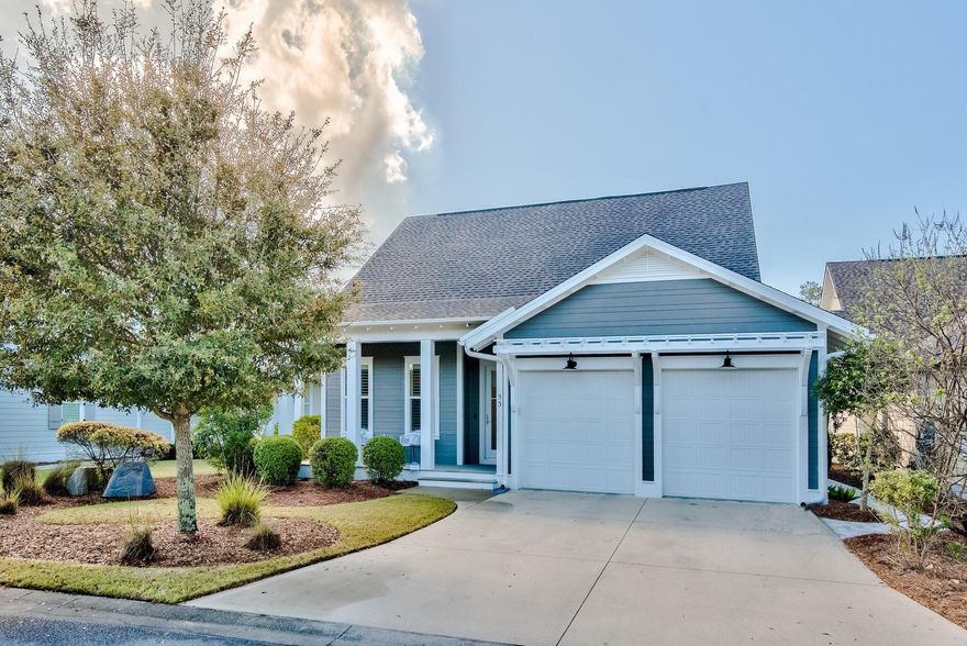 This Popular Coral Bean floor plan offers 4BR/3.5BA, 2 car garage. Home offers Hardwood flooring in living areas including owners suite and guest on the main, Quartz counter tops throughout, under counter lighting in kitchen. Oversized patio with Firepit. Kitchen is complete with Professional Frigidaire series stainless appliances with a natural gas range /electric oven, dry bar with beverage center and glass front upper cabinets. Owners suite w/ tile flooring, soaking tub, dual vanity and large walk in closet. Guest suite on the main with private bath. Spacious 2ndary bedrooms,  WIFI controlled thermostats for remote access, Garage storage system for bikes, kayaks, paddleboards, golf clubs, all your fun toys Lot Features: Lush green lawn w/ lighted paver path to the backyard gas firepit and screen porch. 

Additional Community Features: 5 miles of hiking and biking trails. Dock with community kayaks available. Beautiful dune lake for swimming, sailing, fishing, paddleboard right into the Gulf of Mexico. 