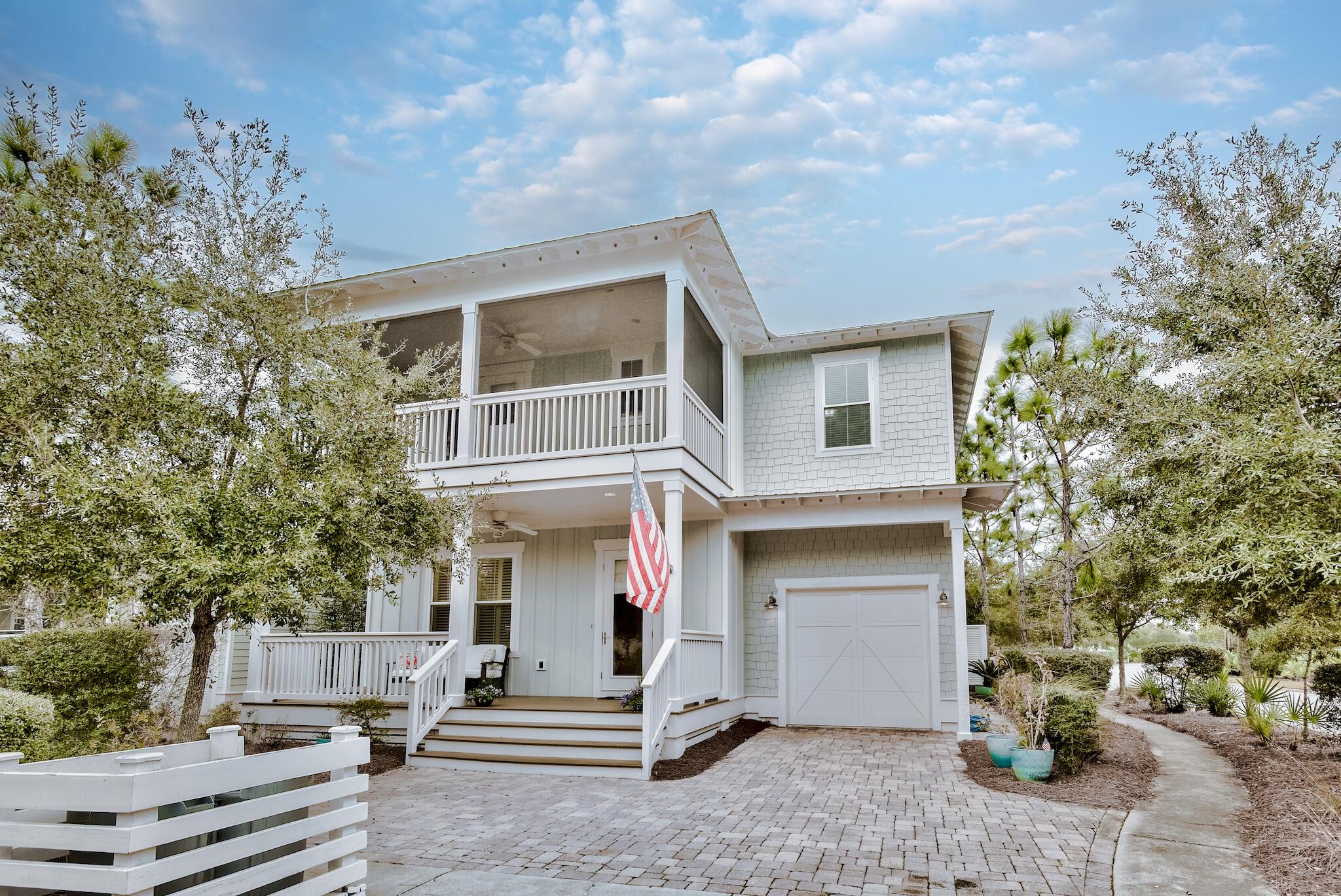 This property is projected to bring in 135k in annual rentals, making it a lucrative investment for any second home or vacation rental buyer. The Windjammer plan is part of the Cottage collection and offers 3,037 square feet, one car garage, an owner's lock out closet, features dual master suites, 4BR/4.5B, open kitchen, dining, floorplan.  First floor includes office/flex space and shiplap walls. Kitchen features island with built-in wine rack and shelf ends, farmhouse sink, upgraded cabinets, granite, glass tile back splash, stainless steel built in appliances including gas cooktop, natural pine flooring throughout home, fire place, butler's pantry with sink, wine fridge, 2 laundry rooms, 1st floor master suite, 2 floor master suite, flex space with wine fridge on second floor.