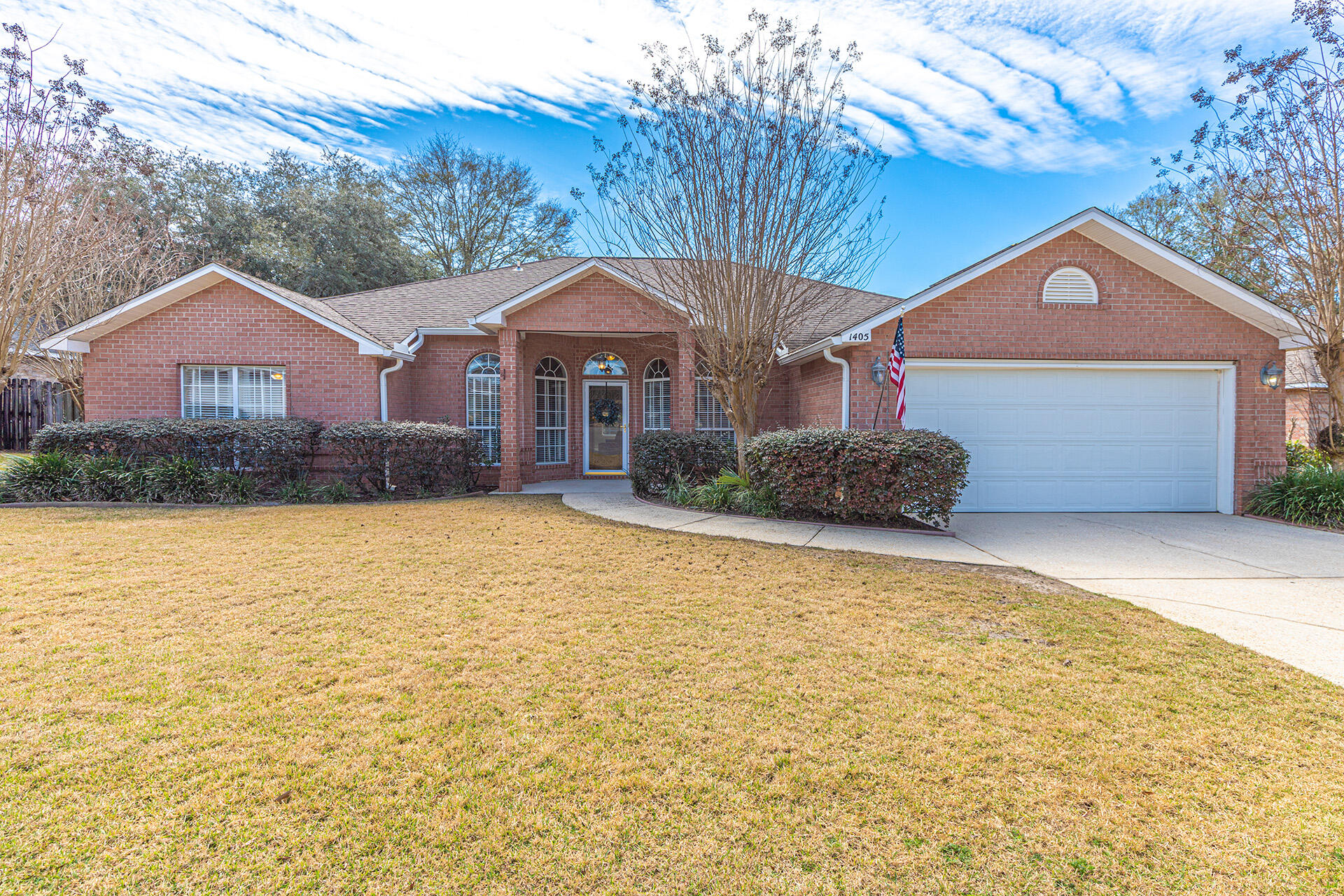 Located in the gated community of Magnolia Plantation in Bluewater Bay, you will want to make this beauty your NEXT HOME! Complete with a beautiful sparkling in-ground pool, this 4 bedroom, 3 full bath, split floor plan house is conveniently located on a non-thru street. From the foyer, the office/family room is found to the left, while the dining room is on the right. Through the foyer, the spacious living room boasts raised ceilings and a gas fireplace and allows entry to the sunny and sizeable Florida Room. The large kitchen contains custom white cabinetry, a center island, and separate pantry. The breakfast nook is located adjacent to the kitchen with a view of the pool,
