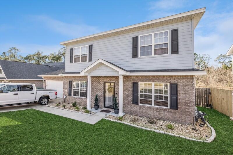 Beautiful custom built home in South Crestview. Built in 2020, this luxurious home offers modern amenities, a spacious layout, and high end finishes. With over 2100 square feet, it features an open living area with nine foot ceilings and natural light. The kitchen boasts granite countertops, stainless steel appliances, and a large island. Upstairs, the master suite includes a walk in shower, dual vanities, and a walk in closet. Two additional bedrooms share a full bath. A dedicated laundry room adds convenience. The fenced backyard with a deck is perfect for entertaining. Energy efficient features help reduce costs. Located near Eglin AFB, shopping, schools, and beaches. Move in ready, this home offers comfort and style. Your Custom Oasis awaits!