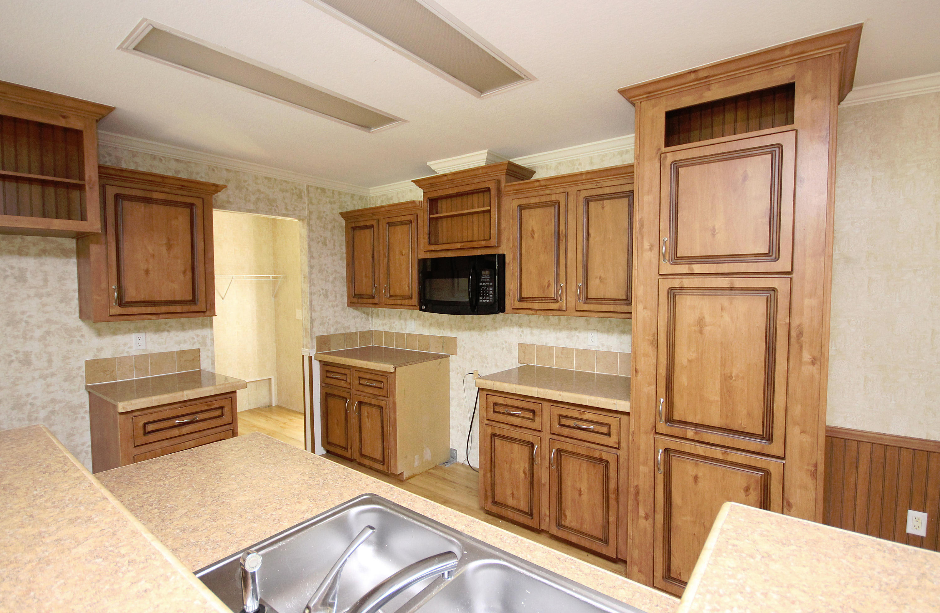 Look no further!!! Large 3 bedroom home under 100k, in Niceville! Come take a look today at this beautiful corner lot home. New flooring has just been installed and new Appliances, and new HVAC will be installed prior to closing. Call today before this one is gone! VA financing available!