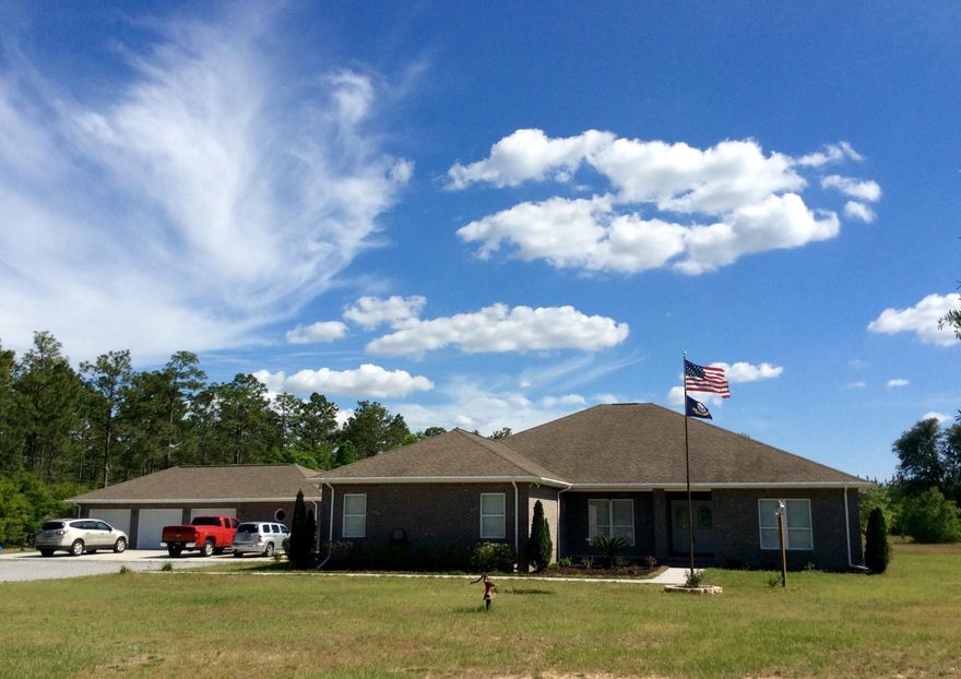 COUNTRY ESTATE on 11.08 Acres, Custom energy efficient home with over 4600 sqft of living space, 4 car garage with separate office, bathroom, and bonus room/mancave, separate mother-in-law cottage or future pool house with kitchenette and bathroom, geothermal system, smart wiring, generator, 10ft ceilings, tile throughout, central vac,and that is just the beginning! This home features an open floor plan with arches, tall ceilings, a kitchen with a professional style 48' gas cooktop with griddle, built in oven,warning drawer, huge built in fridge, custom cabinets with pullouts, pop up mixer stand, granite countertops, island, walk in pantry and a separate pantry for large kitchen gadgets and appliance storage! The master bedroom is a true SUITE, with attached office/5th bedroom/nursery, an