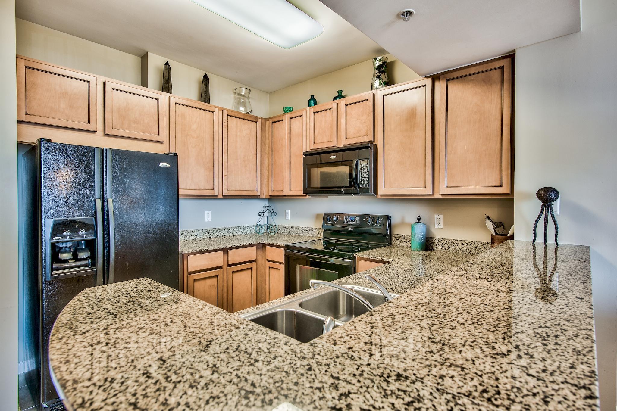 Wait until you see the unobstructed view of Henderson State Park from this 5th floor unit located at The Palms of Destin! Kitchen features a granite counters and maple cabinetry. You're able to access the balcony from both the living room & master bedroom, and when on the balcony, your view is of the beautifully manicured pool area. Buyer to verify all information.