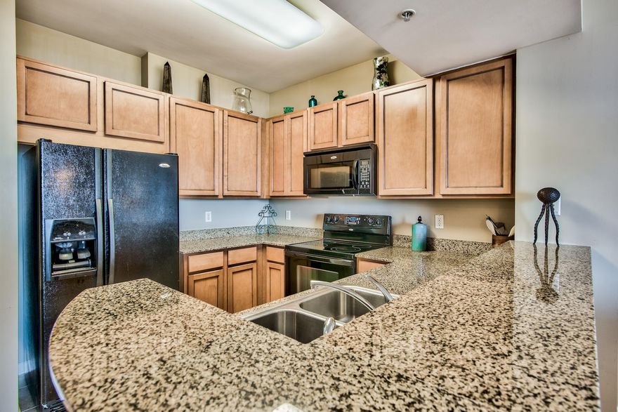 Wait until you see the unobstructed view of Henderson State Park from this 5th floor unit located at The Palms of Destin!  Kitchen features a granite counters and maple cabinetry. You're able to access the balcony from both the living room & master bedroom, and when on the balcony, your view is of the beautifully manicured pool area. Buyer to verify all information.
