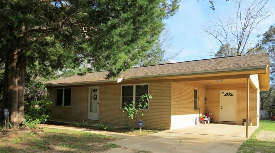 When searching for the perfect home peace and tranquility are key. Home is located on slightly over an acre lot with several producing pecan trees, plenty of garden space, and yard buildings for your tools/lawn equipment. This beautiful home has been updated throughout over the last several years. Some of the updates include a new drain field for the septic system(2018), newer roof(appx.5yrs), gorgeous flooring throughout, a completely renovated kitchen, and much more. This home won't last long so don't wait call to schedule your appointment today!