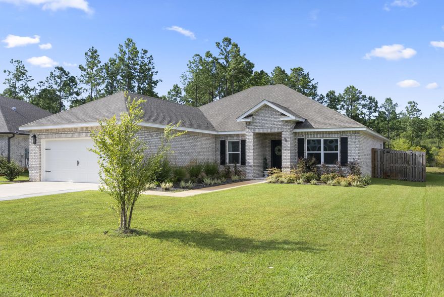 SELLER is OFFERING a 3% BUYER CONCESSION CREDIT towards buyers closing costs, with a full priced offer! VA Assumable loan at 6.49%. Ideally situated within the exclusive, Aurora subdivision of Hammock Bay, this home was beautifully built in 2023. Featuring 4-bedrooms, 2-bathrooms, it offers the perfect balance of thoughtful design throughout, backed by a charming view of the pond, and a fenced-in yard for added privacy. As you step inside, you'll be greeted by a seamless layout that connects the living room, dining area, and kitchen. The kitchen is truly the heart of the home, featuring high-end painted cabinetry with modern hardware, updated luxe lighting fixtures, Quartz countertops, stainless steel appliances, and a huge bonus: a KitchenAid refrigerator that conveys with the sale. A built-in bookshelf and charming window seat with hidden storage that add both functionality and character. The primary suite serves as the ultimate peaceful retreat, complete with two spacious walk-in closets and a private en-suite bathroom featuring an updated double vanity and a tiled shower. The additional three bedrooms offer flexibility for guest rooms, a home office, or a growing family, and are served by a full bathroom with a shower/tub combination. 

A two-car garage and extended driveway provide ample parking, while the fenced backyard and covered patio offer the perfect setting for morning coffee or sunset gatherings with natural foliage, and pond views as your backdrop.

Beyond your doorstep, Aurora residents enjoy exclusive access to all the Greater Hammock Bay amenities  resort-style and lap pools, tennis, pickleball, and basketball courts, fitness centers, bay clubhouse, exclusive dock, frisbee golf, playgrounds, scenic trails, and a vibrant community. Why leave home when you have almost all you need at Hammock Bay's town center: shopping, dining, food trucks, Props Brewery, a medical/dental plaza, and a new amphitheater for local events. Best of all, the sugar-white sands of the Emerald Coast are only 25 minutes away!

This is more than just a home, it's a lifestyle. Schedule your private showing today and experience all this exceptional home has to offer! 