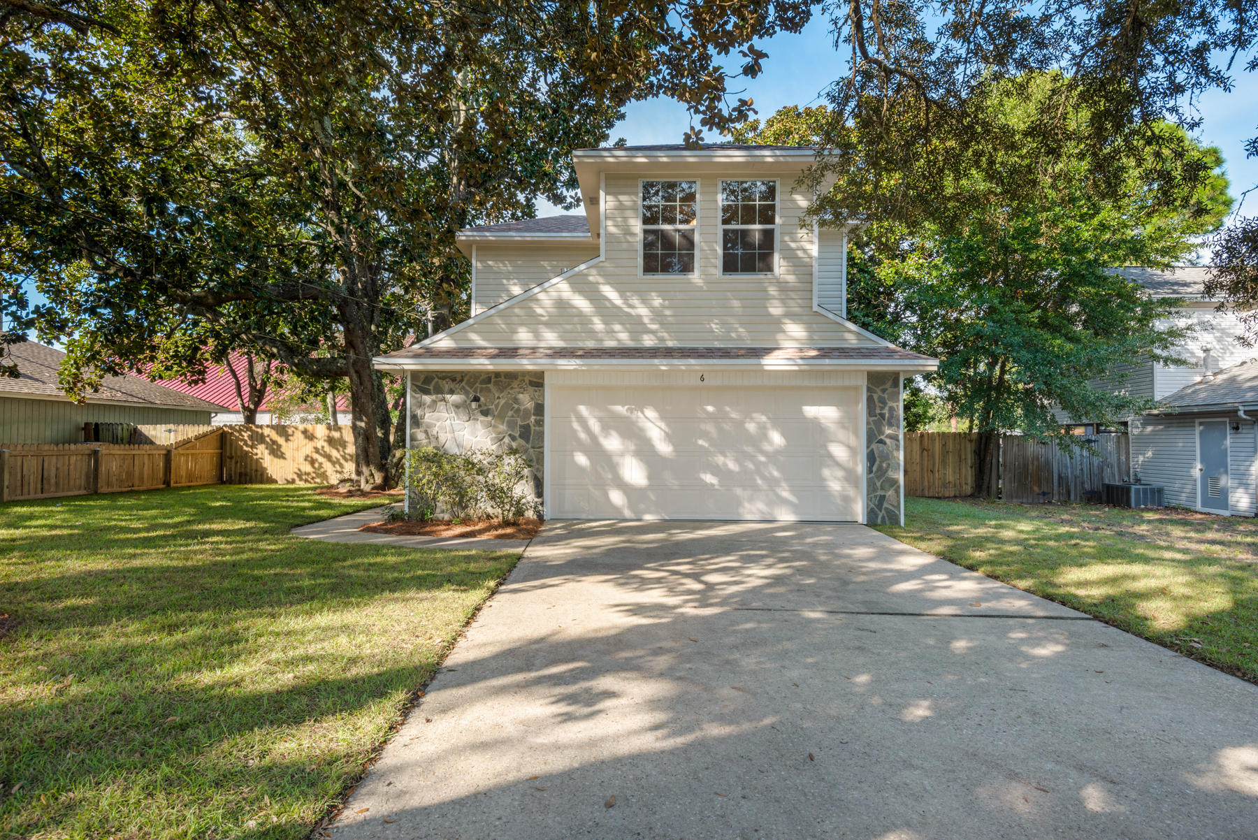 Completely renovated 3 BR/2 1/2 bath, 1628-SF home close to Hurlburt Field AFB and downtown Fort Walton Beach. New Roof, new HVAC, new water heater, new siding, new windows and exterior doors, new kitchen, new bathrooms, new flooring throughout, and fresh paint throughout, all in a neutral palette. Heating and hot water are gas for reduced energy costs. You will love the plentiful cabinetry space and pantry in the large kitchen that features a wonderful 5-burner gas range. All new stainless appliances. Indoor laundry room. Oversized 2-car garage. Good-sized bedrooms. Privacy fenced yard with new sod. This house is a MUST-SEE to appreciate all the quality work and upgrades that have made this renovation feel just like a brand new home. Meticulous attention to detail. Will not last long