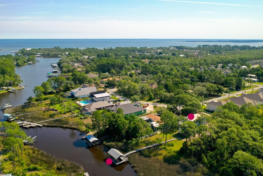 Boaters dream!!! Welcome to 95 Bluebell Cir  Santa Rosa Beach FL.  This home offers waterfront privacy on Mack Bayou. Nestled on .43 of an acres with 86 lf of waterfront. Mesmerizing bayou views. Newly renovated eat-in kitchen with stainless appliances. Open floor plan to living room overlooking the bayou and your personal covered dock with lift. Off the Living room is a large covered porch just perfect to entertain. The master suite on the 3rd floor includes a walk-in closet, dressing room, full bath, walk-in shower, and private sun deck.  additional two bedroom with full baths all excisable by stairs or elevator.  Both HVAC ''Carrier'' are brand new as of May 31 2024. There's a Bayou Pines boat launch just two lots over. Plus a Bayou Pines dock.    Bayou Pines boat launch and dock make this home truly exceptional. Don't miss the chance to make this waterfront haven your own. Seller's are motivated. 