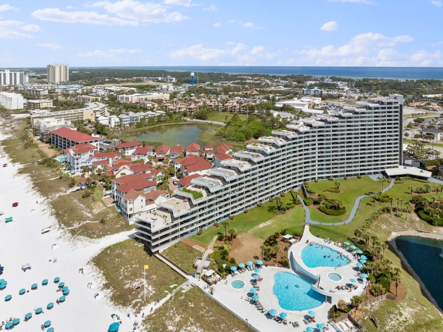 The Edgewater Condominium not only boasts the perfect location near shopping, dining, etc, but also offers top notch amenities including 425' of private beach. Unit 900 has stunning gulf views from the living, dining, kitchen & master bedroom along w/ a strong rental history. The unit was updated in 2015 to include new flooring throughout, ceilings scraped & re-finished, all doors replaced. The kitchen received a full make over w/ new appliances, countertops, step island knocked down to create flat island, backsplash added & even added a tray ceiling. Bathrooms received new countertops, mirrors, fixtures, &  in master bathroom the bathtub was removed to make way for a new beautifully custom tiled walk-in shower. SELLER WILL PAY all of remaining 2025 HOA fees w/ acceptable offer. Edgewater Beach also a gated entrance, covered parking along with a large pool w/ tiki hut, fitness center, playground, shuffleboard, and a basketball court. You cannot compare the combination of amenities, views, location, etc. 