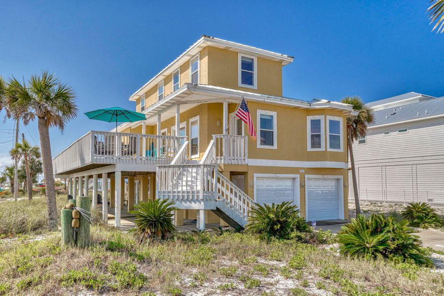 Reduced $55,000. Catch the Awesome Gulf & Sound WATERVIEWS from this Super Well Maintained 5 Bedroom/3 Bathroom, 2754 Sq Ft, Fully Furnished, Turn-Key, Home in Highly Desired Grand Navarre Community, on a Corner Lot, WITH LOCKOUT SUITE, located only a Football Field Away from Beach Access, with Huge Wrap-Around Deck, no HOA Fees and Waterviews from Most of the Rooms!