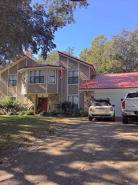 A LOT OF HOUSE WITH A LOT OF POTENTIAL. NEEDS SOME UPDATING, BUT YOU ARE GETTING A LOT OF HOUSE IN BLUEWATER BAY WITH GREAT SCHOOLS. HOUSE HAS HAD A METAL ROOF INSTALLED AS WELL AS VINYL SIDING. LARGE FENCED IN BACKYARD. HOUSE IS BEING SOLD AS-IS.