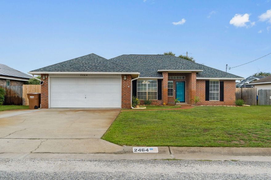 *Sellers are offering $10,000 towards a Buyer's closing costs or interest rate buy down!* Welcome home to this lovely brick east Navarre home with a new roof and no HOA! Located in a popular area close to Navarre High School, the YMCA, and the Navarre Youth Sports Association you'll also enjoy being minutes to Navarre's beautiful beaches and a short commute to Hurlburt Field! Pull up and appreciate the extended driveway pad for additional parking space and a well maintained exterior. This 3 bedroom, 2 bath home has a warm and welcoming entryway that boasts a great open floor plan with split bedrooms, vaulted ceiling that opens up the large living room, and hard surface laminate and tile flooring throughout (no carpet!). The spacious floor plan also showcases a formal dining room space,