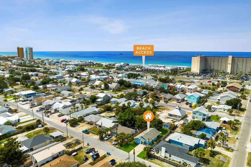 ***SELLER WILL CONSIDER ALL OFFERS!***Your next investment property or beach vacation home is ready for you NOW!--FULLY furnished, turnkey, and ready to rent upon closing--Walk to public beach access #12 and #13--Sleeps 8--Fabulous backyard mural--Room to add a pool--Storage shed with beach gear and hurricane panels--Stocked owner's closet - all items convey--Irrigation systemAsk your agent for the Airbnb link and to schedule a tour.Property video available also.Thank you for your interest.  We are eagerly awaiting your offer! --8-min. Walk to Beach - Fire-Pit
--Fenced-In Backyard - Charcoal Grill
--Equipped Kitchen - Coffee Bar
--4 Smart TVs + Roku - Smores Station
--Washer + Dryer  - Florida Room
--Beach Gear + Games 
--Dog Accessories - Outdoor Shower
--Boat/Trailer Parking - 4-Car Driveway

1 min to Dolphin Boat Ramp, Busters Beer & Bait (Live Music)
3 min to Schooners (Beachfront Restaurant), Rick Seltzer Park
4 min to St. Andrews State Park, Publix

Property Highlights:
--Bedroom 1: King Bed + Private Ensuite
--Bedroom 2: Queen Bed
--Bedroom 3: Twin/Twin Bunk Bed (Entrance from Florida Room)
--Living Area: Queen Sleeper Sofa

Indoor Comforts:
Enjoy an open-concept layout with cozy furnishings, Roku Smart TVs, remote-controlled ceiling fans, and a fully remodeled kitchen. The living area and dining space flow seamlessly together, creating a bright and welcoming environment for everyone to gather and relax.

Outdoor Oasis:
--Private Backyard: Fully fenced for privacy
--Florida Room: A screened-in patio to unwind bug-free
--Fire Pit & Charcoal Grill: Perfect for cozy evenings under the stars
--Beach Gear: Chairs, umbrella, wagon, games, plus beach favorites like Corn Hole, Spike Ball, Jenga, Ring Toss, and Bocce Ball
--Front Porch & Outdoor Seating: Ideal spots for morning coffee or evening relaxation
--Nearby Boat Ramp: Just 0.1 miles away with open ocean access

Fully Equipped Kitchen:
Designed with all the essentials, this kitchen has everything you need, including a Keurig and drip coffee machine, French press, toaster, spice rack, and even a s'mores station! Enjoy cooking with the convenience of a dishwasher, microwave, and ample dishware and cookware.

--Linens, Towels, Hair Dryer, and Straightener
--Laundry and Dish Supplies Provided (contents of owner's closet convey)

Parking:
Driveway parking for up to 4 vehicles, free street parking, and designated space for boats, RVs, or trailers.

Safety & Convenience:
This home is equipped with a Ring Doorbell (front), a Ring Floodlight (backyard), a Google Nest Thermostat, and a Schlage Smart Lock for secure, keyless access.