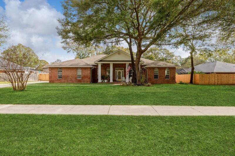 Fantastic home with 4 bedrooms plus an office. Renovated bathrooms, kitchen and new flooring. Florida room across the back of the home. Concrete pad for Boat or Rv parking behind the fence. New covered back patio, refinished gunite pool. New roof and gutters in 2019, HVAC 2016, 2019 pool heater, 2021 pool pump. Solar panels added in 2023 with a transferable loan.Don't miss this amazing home!