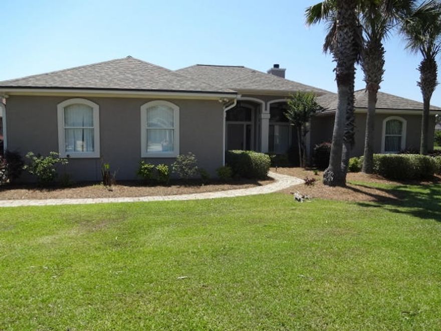 Completely updated beautiful golf course home. This three bedroom 2.5 bath has all you are looking for. Gourmet kitchen with top of the line stainless steel appliances ,double oven, propane cooktop and custom cabinetry Open and inviting floor plan great for entertaining and enjoying the wonderful golf course views. Master suite has patio access, a spacious bathroom and closet with custom shelving. Garage is oversized with plenty of space for additional storage. The patio is a combination of covered, enclosed and screened area to create your personal resort experience surrounded by beautiful landscaping, pool that is heated and a hot tub. The home has a sprinkler system, water purification system, a new roof, 2013, with a transferrable warranty and there is a termite bond on home.