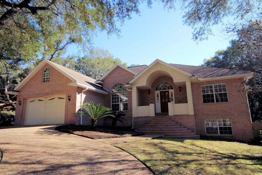 *GOLD STAR PREFERRED PROPERTY* Custom all brick home is located in secluded, Private Poquito Bayou. We invite you to come tour this 5 Bdrm 3 Full Bath executive home with Pool, ready for its new owners starting at the arched entry spacious foyer separated from Family Rm by columns & arches, 9' ceilings, tray ceilings, fireplace open to Family Rm as well as Hearth Rm, gorgeous master bath, full daylight basement w/2nd Kitchen, Recreation Rm, 2 Bdrms & Full Bath, Loft/Bonus Area over Study is great for storage requiring climate control. Gourmet Kitchen, sub zero refrig, and upgraded appliances. 6 zone Surround Sound Speakers in home. Rennai continuous instant hot water system installed in home. Existing home warranty in place that was renewed in April 2014. Call to see today!