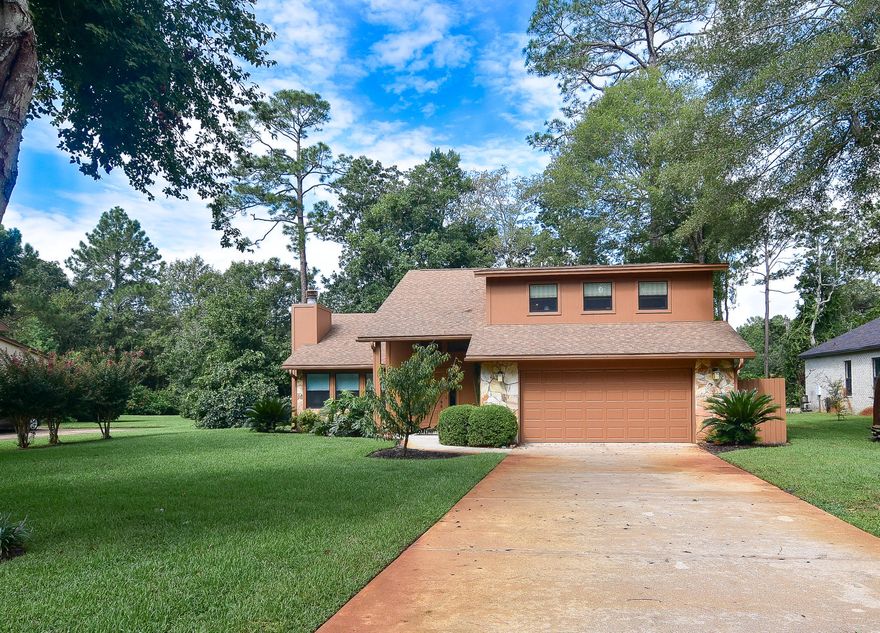 Beautiful executive home, loaded w/ upgrades. 4 bedrooms plus upstairs den make this ideal for your family. Great room w/ wood burning fireplace and cathedral ceilings has tons of natural light from large windows w/ custom shades. Formal dining area opens into florida room, perfect for sunny morning coffee time. Large updated kitchen, ready for cooking & entertaining w/ island eating area and separate desk/computer area. So much cabinet space plus walk in pantry! Master on lower level w/ slider to back living area. Master en suite bath has updated separate tub & walk in shower plus double vanity. Upstairs bedrooms have sliders to balcony overlooking shaded back yard. Second full bath upstairs w/door to den and hallway. Large lot w/ mature fruit trees & plenty of shade. A must see