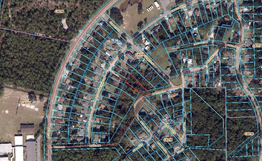 .2721-acre wooded interior lot zoned MDR. Public water and public sewer with ECUA. According to GIS map, no wetlands, topo is clear, and X flood zone. Tap fees have not been paid.  Per zoning, Medium Density Residential (MDR) zoning district allows for a mix of housing types, including single-family detached and attached homes, duplexes, triplexes, fourplexes, garden apartments, and mobile home parks, along with certain public and quasi-public uses. See docs for more info and setbacks