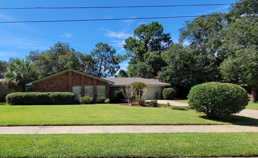 Wonderfully located in Kenwood area making this home with only 2 owners a real gem! 2nd Owner has completed many upgrades. NEW ROOF 2018NEW Kitchen Upgrade 2016. NEW Master Bathroom Upgrade 2016.  Huge Kitchen with granite countertops and newer cabinets and LVT flooring.  Master bathroom upgrades with tiled shower and cultured marble countertops. Family room boast a wood burning fireplace and plenty of room for TV relaxing. Back yard has a full line up of mature shrubbery including Azaleas.  Completely fenced PLUS a 2nd fenced in area with carport type structure for your boat or jet skis.  This incredible home has a huge laundry room with a ''man's area for tinkering.  Double garage also has another storage space.