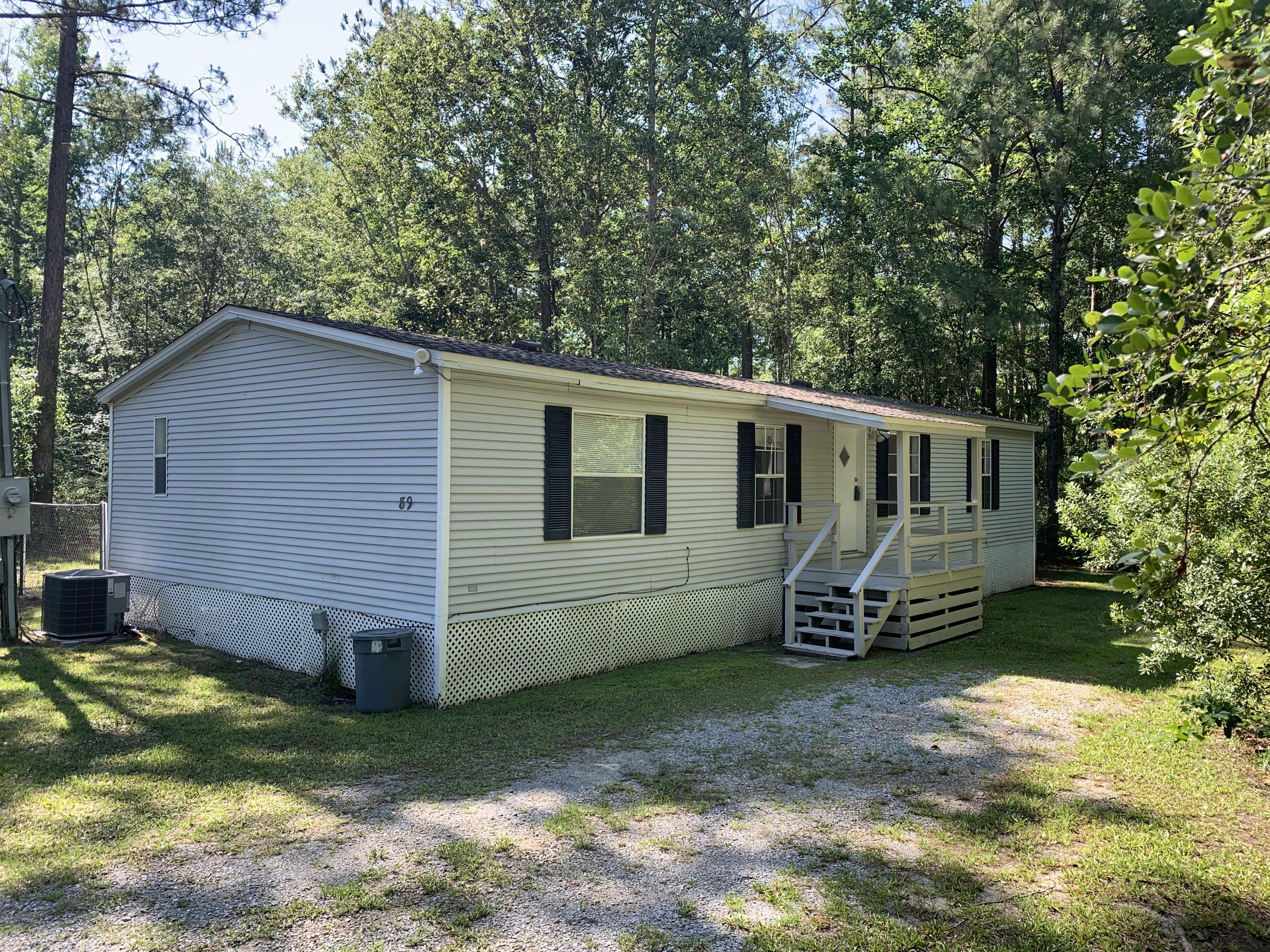 Come check out this 3 Bedroom, 2 Bath Double-Wide Manufactured Home on 0.75 acres right in the heart of Freeport, FL. Accepting Cash or financed offers! No HOA! Perfect for a weekend getaway or a rental. Newer HVAC outside unit installed, fenced in backyard, nice colors on the inside, and vinyl flooring throughout. Come check it out.