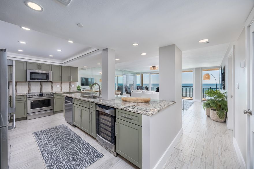 Discover luxury coastal living in this completely customized 3-bedroom, 3-bathroom end-unit condo on the exclusive 7th floor of The Breakers on Okaloosa Island. Offering 1,748 sq. ft. of thoughtfully designed space, this stunning residence provides direct, unobstructed Gulf views while being peacefully removed from pool noise. With secured elevator access and no short-term rentals on this floor, enjoy the privacy and tranquility of this premier top-floor corner unit. Unmatched Gulf front Views & Living Spaces Expansive living & dining areas designed to maximize natural light, featuring end-unit windows and floor-to-ceiling sliders leading to a private balcony with panoramic Gulf views.Extended balcony (2nd largest in the complex) with a private exterior storage unit--(MORE) perfect for beach gear.
Media console pre-wired to extend into the master suite and bathroom.
Gourmet Kitchen - A Chef's Dream
Open-concept layout for a seamless flow and enhanced beach views.
High-end stainless steel appliances, soft-close cabinetry, a dedicated wine refrigerator & wine rack.
Granite countertops, under-cabinet mood lighting, and cove lighting above cabinetry.
Oversized 9-ft island & hall pantry for extra storage. Master Suite - A Luxurious Waterfront Retreat Direct Gulf-front views with private balcony access. His & hers closets for ample storage. Spa-like en-suite bath featuring a custom walk-in tile shower with a rain head, hand-held shower, and four body jets. Double vanity with backlit mirror, makeup mirror, under-cabinet lighting, and built-in speaker system. Two spacious guest bedrooms, each with its own full bathroom. Guest Bath 1: 71" soaker tub with a beautiful backlit tile accent wall. Guest Bath 2: Custom tiled shower with rock sink bowl and a shelf for bath essentials. Plantation shutters & mounted flat-screen TVs in both guest rooms. Additional High-End Features Full-size washer & dryer (rare for condos). Oversized water heater for continuous comfort. Plumbed for a central vacuum system for added convenience. This exceptional turnkey property offers the perfect blend of elegance, comfort, and modern convenience. With its high-end finishes, unmatched Gulf views, and exclusive 7th-floor location, this is truly a rare opportunity in today's market. Don't miss outschedule your private tour today!
