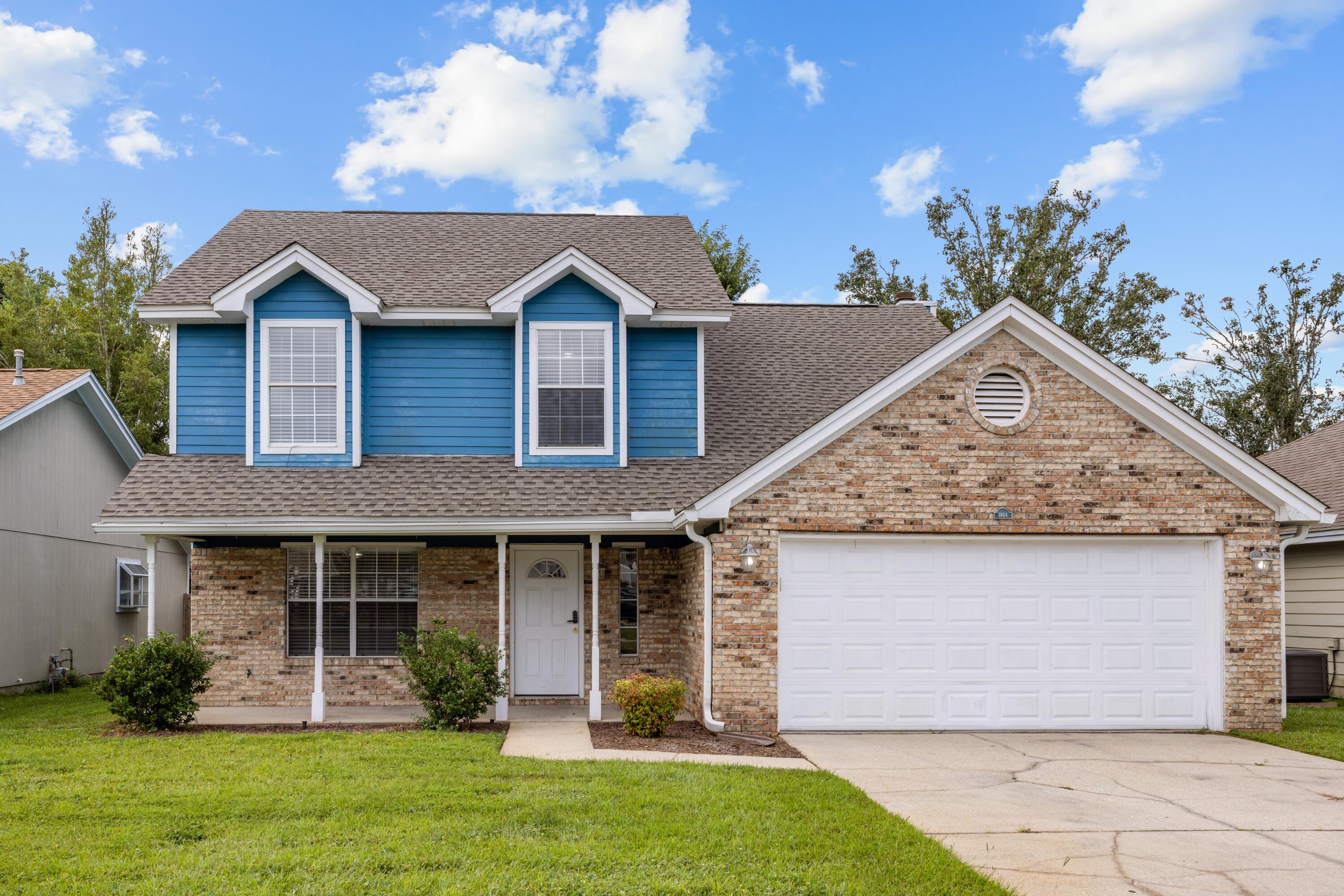 Move-in ready 5-bedroom 2.5 bath home with 1638 square feet of comfortable living space and is ideally located just 6 miles from Eglin Air Force Base, 8 miles from Hurlburt Field, and 6.5 miles from the sandy shores of Okaloosa Island. Convenient amenities such as Aldi, Lowes, Kohl's, fast-food and restaurants, schools, and various shops and services are all nearby, providing easy access to everything you need. Home has brick and vinyl exterior with covered porch. Immediately walk into the tile foyer and into the spacious living room, next to the bright, large open kitchen with an eat in dinette area and white cabinetry and appliances. Kitchen has laminate countertop and a tile back splash plus a new kitchen sink faucet. Home has new blinds, light switches and new ceiling fans throughout. Down the hall is a stackable washer and dryer for easy access. Half bath with new vanity downstairs and one bedroom with a wood burning fireplace. Upstairs has the master bedroom and large walk in closet, and master bath with tub/shower combo and three additional bedrooms. The double car garage offers plenty of parking inside and four car space driveway plus a privacy fenced back yard. Don't miss out on this gem...location...location...location!