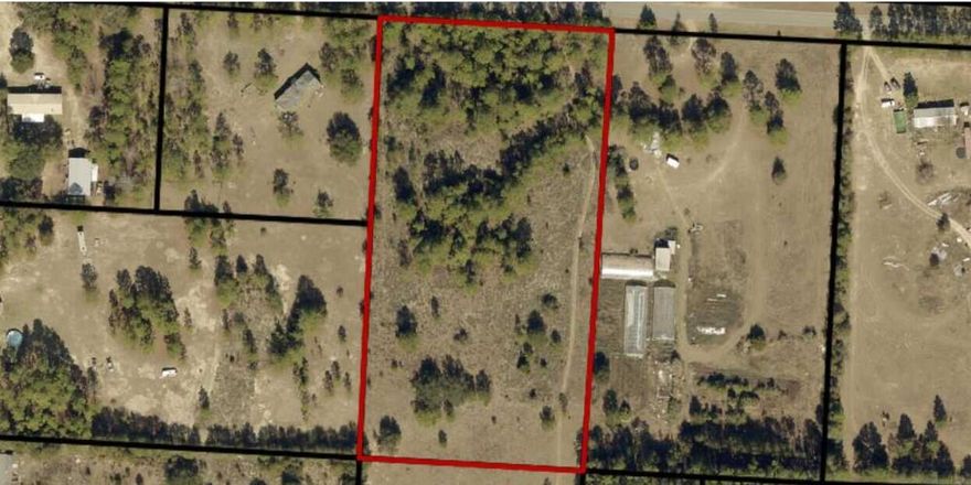 4.810 Acres in East Milton.  Parcel zoned as Rural Residential Agriculture (AG-RR). The allowable density for Rural Residential Agriculture is 1 dwelling unit per acre. Conveniently located close to I-10.  Located in American Farms with direct access off of Redland  Road.