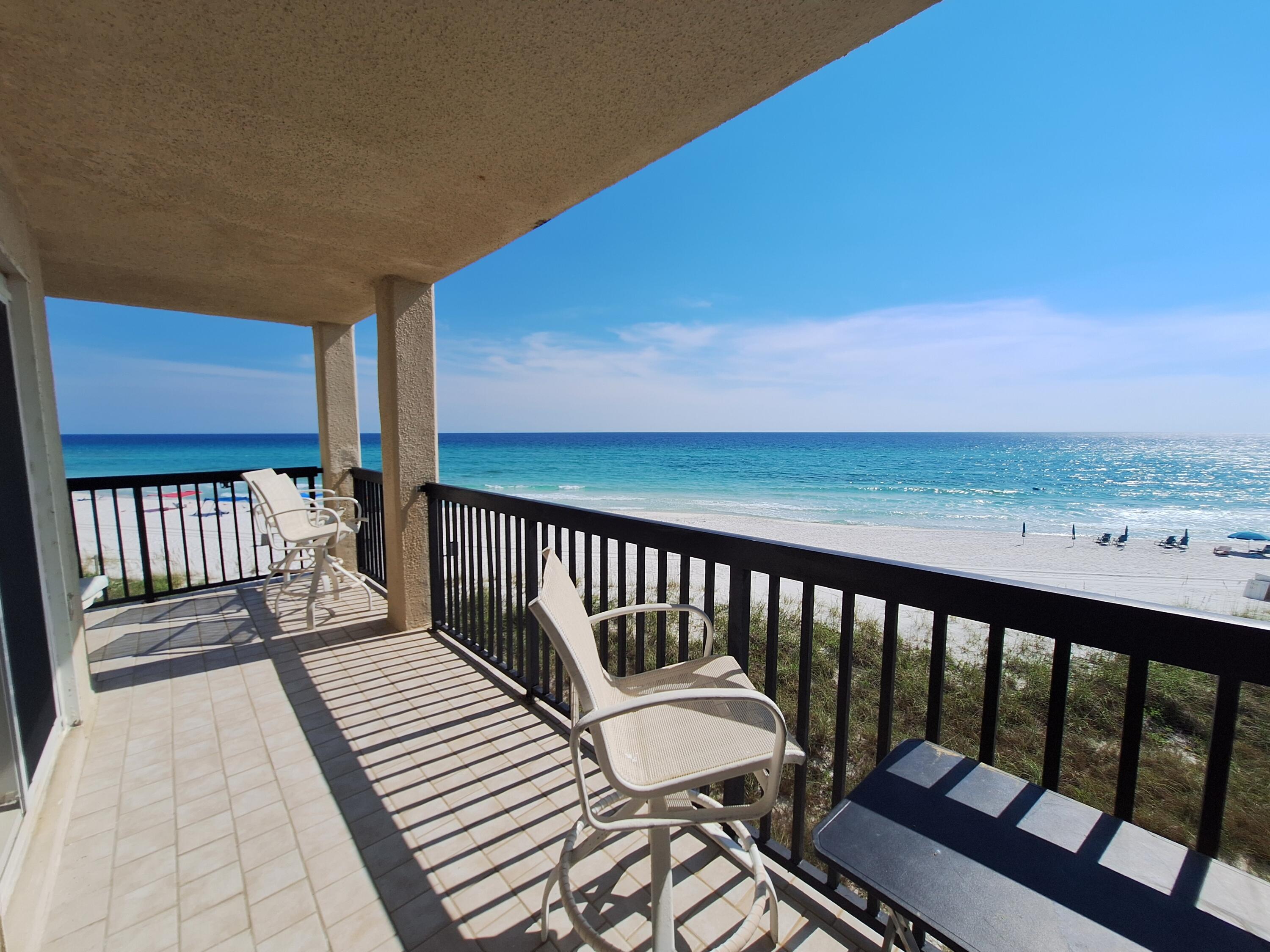 As soon as you step through the front door of this gulf front, third floor, one level, open floor plan condo your eyes are immediately drawn to the glass doors, to the wrap around balcony and the spectacular views of the Gulf, the beach, the sky. As you approach the ample living/dining area you pass the light, bright kitchen featuring a laundry/pantry, a long bar-great for entertaining. The living room has plenty of space for family and friends and has spectacular views of the Gulf. Through the glass doors step onto the L-shaped balcony for even better views. Each bedroom features plenty of closet space, the Master bedroom has great gulf views and a master bathroom featuring a double vanity and a shower/tub combo. There are two secondary bedrooms, one with a ensuite with a walk-in shower