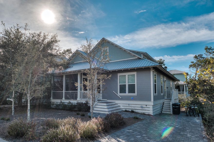 This recently built home is being sold Completely Furnished and rental ready! The Preserve at Grayton Beach is located on a beautiful stretch of 30A. It is a quiet, private, gated community that offers two pools, one of which is seasonally heated, tennis courts, and a clubhouse. A short walk down its private, deeded boardwalk will have you relaxing on the beach in no time! The walk to the beach from the house is approximately 4/10 of a mile, or about a ten minute walk. The neighborhood is surrounded by Point Washington State Forest, offering over 10 miles of hiking and biking trails! As you enter Bluenose, you'll love the bright, open floor plan, ten foot ceilings, and gorgeous hardwood floors throughout! On the first floor, the beautifully decorated living room offers comfortable seating