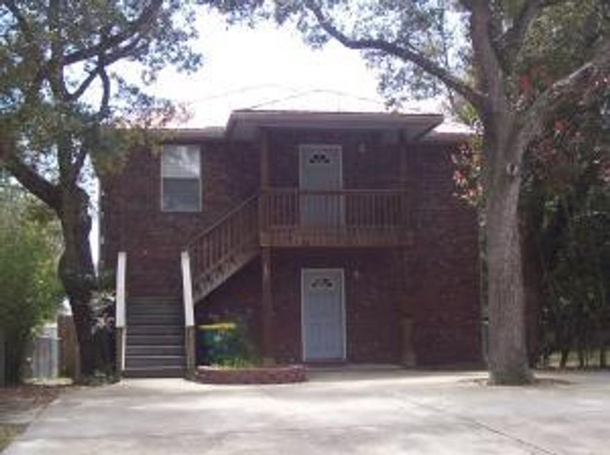 HUGE PRICE REDUCTION!!!This property is an investor's dream, built by Mike Parish AND PRICED TO SELL! Maintenance free home! Two 2/1 units, the bottom floor is currently rented, the upstairs is identical and vacant. Top quality newer upgraded construction, bull nosed corners, crown molding, high baseboards, open floor plan, light & bright, fenced backyard with storage shed, firepit/barbque, trex-flooring deck upstairs, so many values, too little space. Call for appt now!! I'll tell you all about it!!!