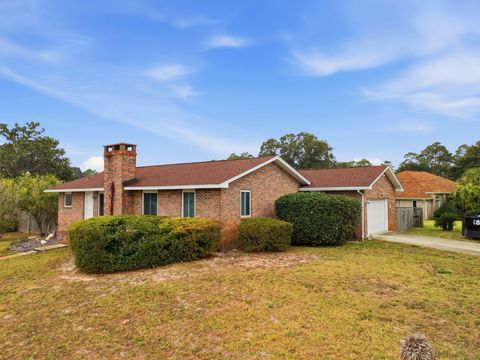 Photo of 7506 N Shores Drive, Navarre, FL 32566 (MLS # 990729)