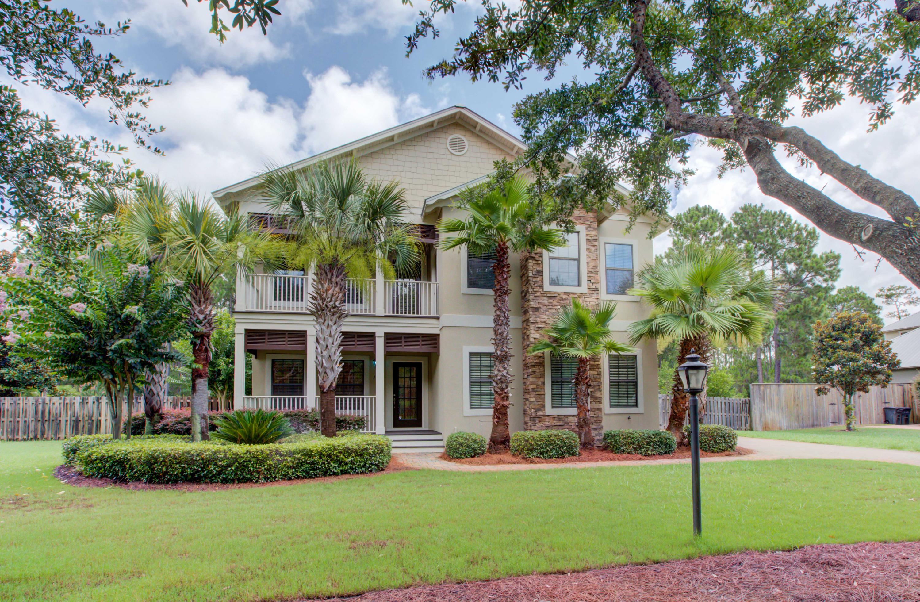 This well constructed, beautiful 4 bed/3.5 bath family home is located behind the private gates of Tradewinds at Topsail. The home sits on half an acre lot with a fenced backyard bordering the State forest. The kitchen boasts stainless appliances and granite counter tops and flows into the living room with French doors opening to the backyard. A large bonus room sits upstairs in addition to the 4 bedrooms. The master bedroom and bonus room open onto the porch overlooking the beautiful front yard. There is custom shelving throughout in the living, bonus room, and a custom closet system in the master bedroom. Tradewinds is conveniently located near amazing schools, 30a's beautiful beaches, great shopping, Sacred Heart Hospital, Publix, golf courses, movie theater and much