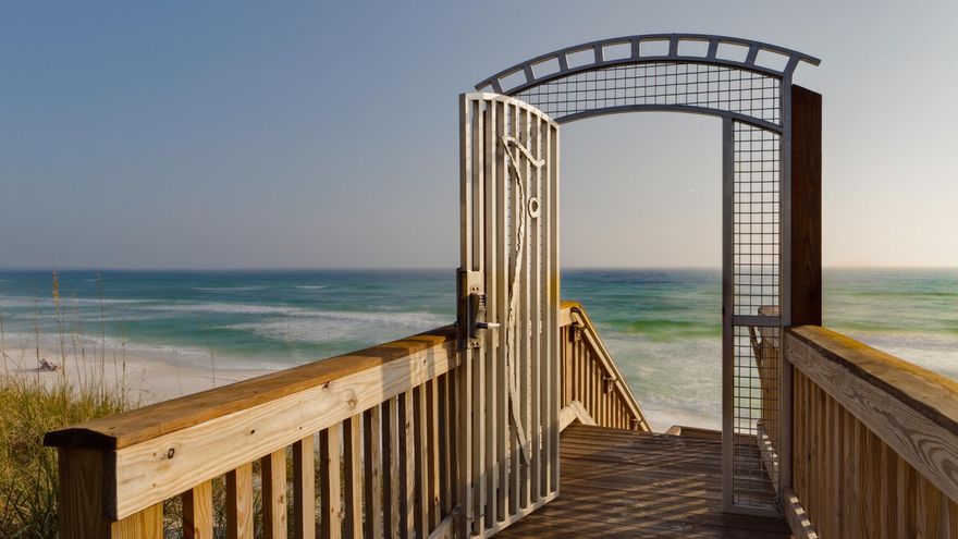 A unique opportunity at Redfish Village, this 4th-floor luxury condo provides gulf views and a westerly orientation for winding down the day over golden sunsets from the condo's oversized corner balcony. Elegant updates include a kitchen and all bathrooms with white quartz counters and vanities, Treme hardwood flooring in mixed acacia and plantation shutters throughout. This spacious 3-bedroom, 3-bathroom coastal getaway comfortably sleeps up to 8 guests. With private laundry area inside the unit for owner convenience. Redfish Village is nestled beside Big Redfish Lake with easy access to beautiful beaches, tasty local spots, and some of the most stunning natural scenery on 30A. Community amenities include a pool, hot tub, exercise room, playground, lakeside boardwalk and beach access. This property comes furnished and decorated for the next owner's comfort and ease. 

Sleeping arrangements include:
Bedroom 1: 1 King bed, TV, deck access, and private bathroom.
Bedroom 2: 2 Queen beds, TV, and private bathroom.
Bedroom 3: 1 Queen bed, TV, and a private bathroom.

All measurements and information are deemed reliable but should be verified by buyer.