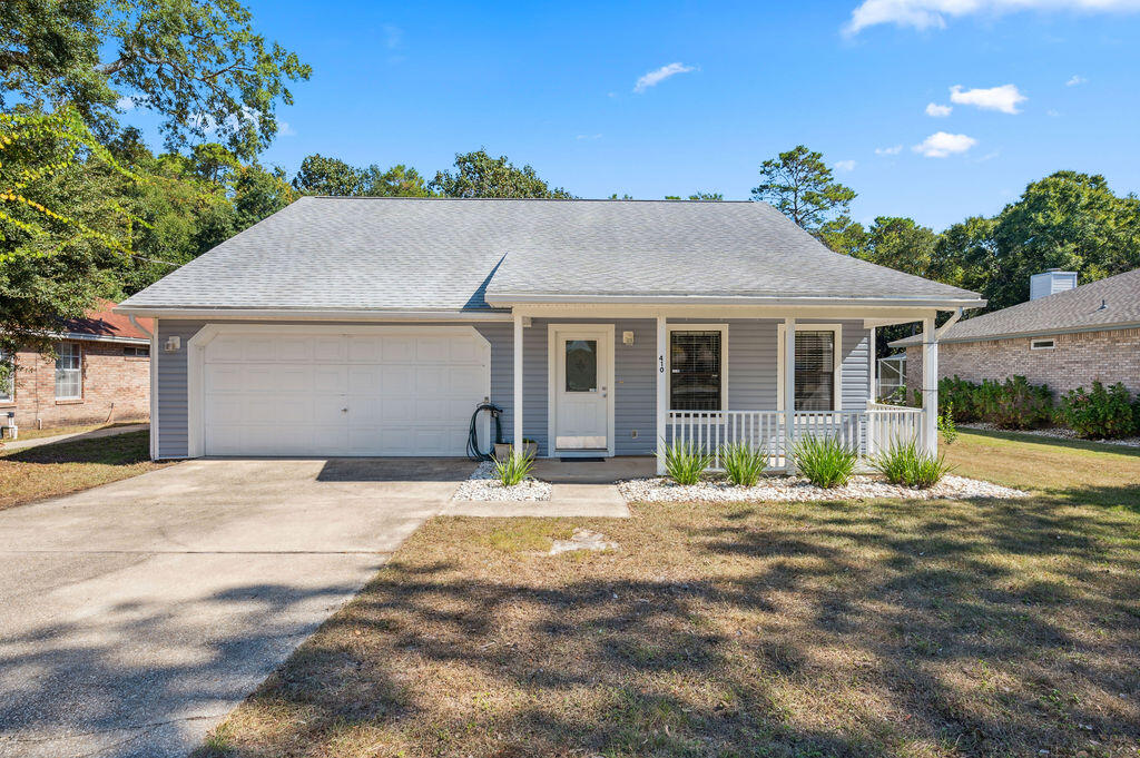 Charming Cottage Style Home. Discover this updated 4-bedroom, 3-full bath home that perfectly blends charm with functionality.  The main level boasts an inviting living room with vaulted ceilings, creating a spacious, airy feel as well as the master bedroom & guest room. Upstairs are two large bedrooms with vaulted ceilings, adding a sense of openness throughout.  In 2015, this home received a thoughtful renovation with stylish updates to the kitchen, lighting, plumbing fixtures, bathroom vanities, and engineered wood flooring.  New outlets, switches, and door hardware were updated as well.  And newly repainted interior trim brings a bright, crisp finish.  This home offers a 2012 roof, 2017 HWH, new dishwasher in 2022, and a new A/C Oct 2024.  The oversized garage includes ample storage storage space, perfect for organizing tools, equipment, or seasonal items. Outside, a privacy-fenced backyard awaits, complete with a cozy firepit areaideal for gatherings or quiet nights under the stars. This move-in-ready home is prepared for its new owners to make lasting memories. Don't miss your chance to call this lovely cottage your own! Schedule a tour today!