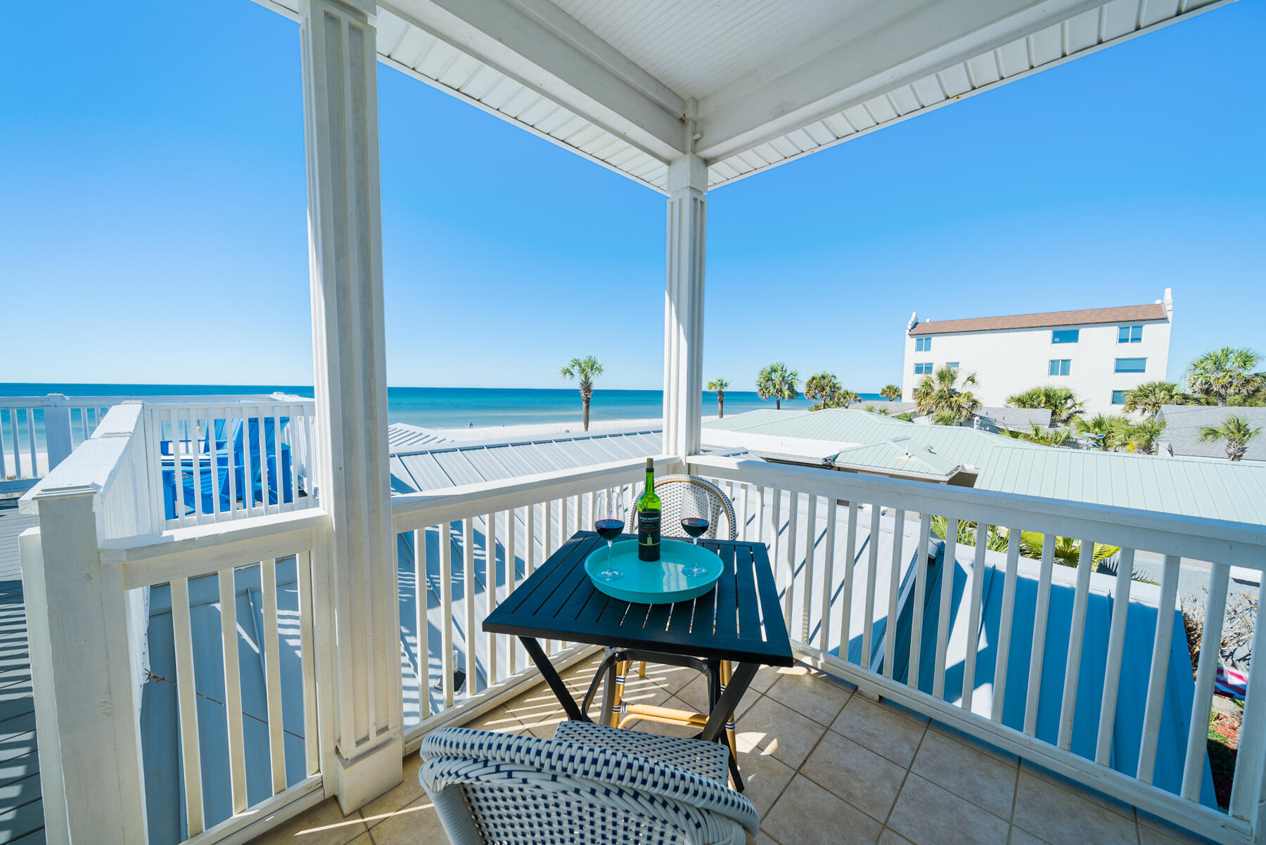 This large gulf-front lot with two beach homes makes this a gem for rental income. Sharing a stunning gulf-front overlook, this impressive beachfront property has a total of six bedrooms and five baths. The two beach houses are connected by a walkover that delivers sensational views of the emerald gulf and beautiful white sandy beach. There's ample parking, a hot tub and more than 1,000 square feet of outdoor living space on a series of decks and terraces. It's an idyllic location for enjoying uninterrupted sunsets and beach-watching. The two-story beach house has two beds, two baths and a bunk room. The spacious kitchen in the main house is fully equipped for families and friends to prepare tasty food and drinks or order up a takeaway.