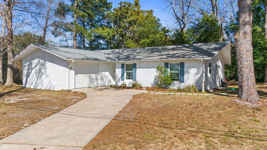 Enjoy a tranquil coastal retreat just 1.3 miles from the beach in this fully remodeled 3-bedroom, 2-bath ranch-style home with no HOA and short-term rentals allowed. Set on a corner lot surrounded by mature pine, cypress, and magnolia trees, this single-level home features an open-floor plan and a spacious kitchen with an oversized island, granite countertops, soft-close cabinetry, and under-cabinet lighting. A exterior lanai offers a peaceful place to unwind and enjoy the natural setting. Additional highlights include updated bathrooms, a one-car garage, and thoughtful upgrades throughout. Only a 5-minute golf cart ride to public beach access, minutes from Pier Park, Pirates Voyage, and Topgolf, and just a 13-minute drive to Inlet Beach and Rosemary Beach, this home offers exceptional versatility as a primary residence, second home, or short-term rental investment.