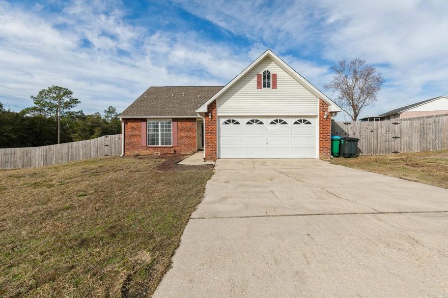 SOUTH OF I-10 ON LARGE CORNER LOT~ 4 BEDROOM, 2 1/2 BATH BRICK HOME~ KITCHEN HAS BEEN UPDATED WITH CHERRY CABINETS, SOLID SURFACE COUNTER TOPS WITH UNDER COUNTER SINK~ BREAFAST ROOM, KITCHEN AND LAUNDRY ROOM IS TILED~ MASTER BEDROOM AND 1 ADDITIONAL BEDROOM DOWNSTAIRS WITH 2 ADDITIONAL BEDROOMS UPSTAIRS WITH SMALL MEDIA AREA~ MASTER BATH HAS DOUBLE VANITIES WITH GARDEN TUB & SEPARATE SHOWER~ LARGE LIVING ROOM WITH FIREPLACE AND LARGE GLASS SLIDING DOORS OPENING ONTO LARGE PATIO IN LARGE PRIVACY FENCED BACK YARD New ROOF INSTALLED AUGUST 2017~ Updated flooring throughout the home.
