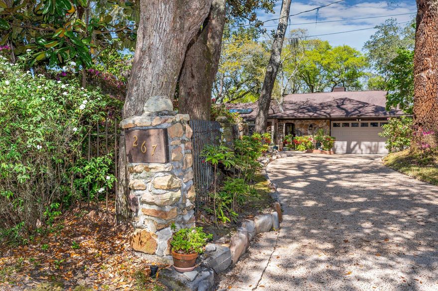 Multiple Offers. Showings to cutoff Sunday at 4pm. Highest and best deadline 4/3 5pm. Hidden away on a quiet cul-de-sac in the center of Fort Walton Beach, this 3,096 sf waterfront home is the perfect water lovers retreat.  Upon entering the front gate, you are immediately greeted by an enchanting garden with a running waterfall & and a heated in-ground pool that can be seen from the kitchen, entry way and heated and cooled sun room.  As soon as you walk through the front doors you will fall in love with the water views.  Overlooking the Cinco Bayou, you have beautiful water views from every room.   The large living area has sliding glass doors that lead to the back deck as well as a gas heated stone fireplace and built in wet bar for entertaining. The first-floor master has his and hers master closets, a master bath with his and hers sinks and custom-built cabinetry for extra storage.  The sliding doors in the master allow you to wake up every morning overlooking the bayou.  Guest will enjoy this same spectacular view from the three upstairs bedrooms with sliding glass doors all along the back of the house.  The dock was redone in 2007 with all new upper deck for sunbathing and entertaining.  Electrical to the dock was updated in 2019 and repairs to the seawall were completed in 2022.  This 4 bedroom 3.5 bath home, has been beautifully maintained with so many charming touches and thoughtful design. Sitting 27 feet above sea level, this home does not require flood insurance.  Just three doors down is the highest point in Fort Walton Beach which means you do not have to worry about flooding.  Along the backside of the home, below the deck is a 60 foot bunker or safe space made of concrete and rebar with a sandy bottom.  This is a great space for additional storage.  The fence just outside the breakfast room is covered in gorgeous aged climbing roses that thrive even without fertilizer or extra care.  

This home is located in the City of Fort Walton Beach which means there are no rental restrictions and short term rentals are allowed.  