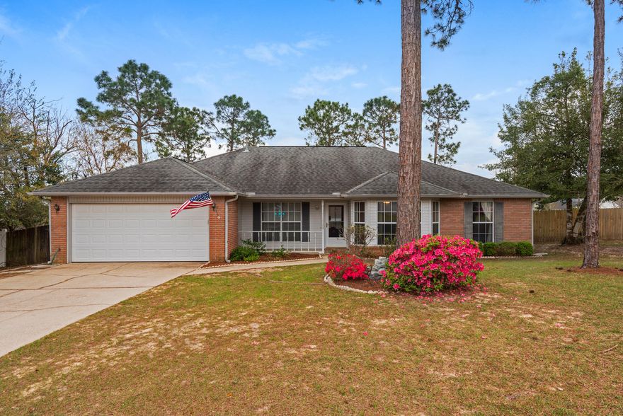 This Crestview cutie is now available for you to call it home! Nestled on a large corner lot with a fenced back yard, boat/RV parking pad, and large storage shed, this adorable home has been well maintained and recently updated. Mature landscaping and a covered front porch welcome you in while the freshly painted walls throughout the home make it feel almost new! As you step inside, you'll find a formal dining room to your left and the first bedroom or office to your right. In the center of the home is the great room with vaulted ceiling, center ceiling beam, gas fireplace, and sliding doors to the screened porch. The split bedrooms include an additional two bedrooms and full bath on one side and the master bedroom and bathroom on the other side. The kitchen boasts plenty of storage,