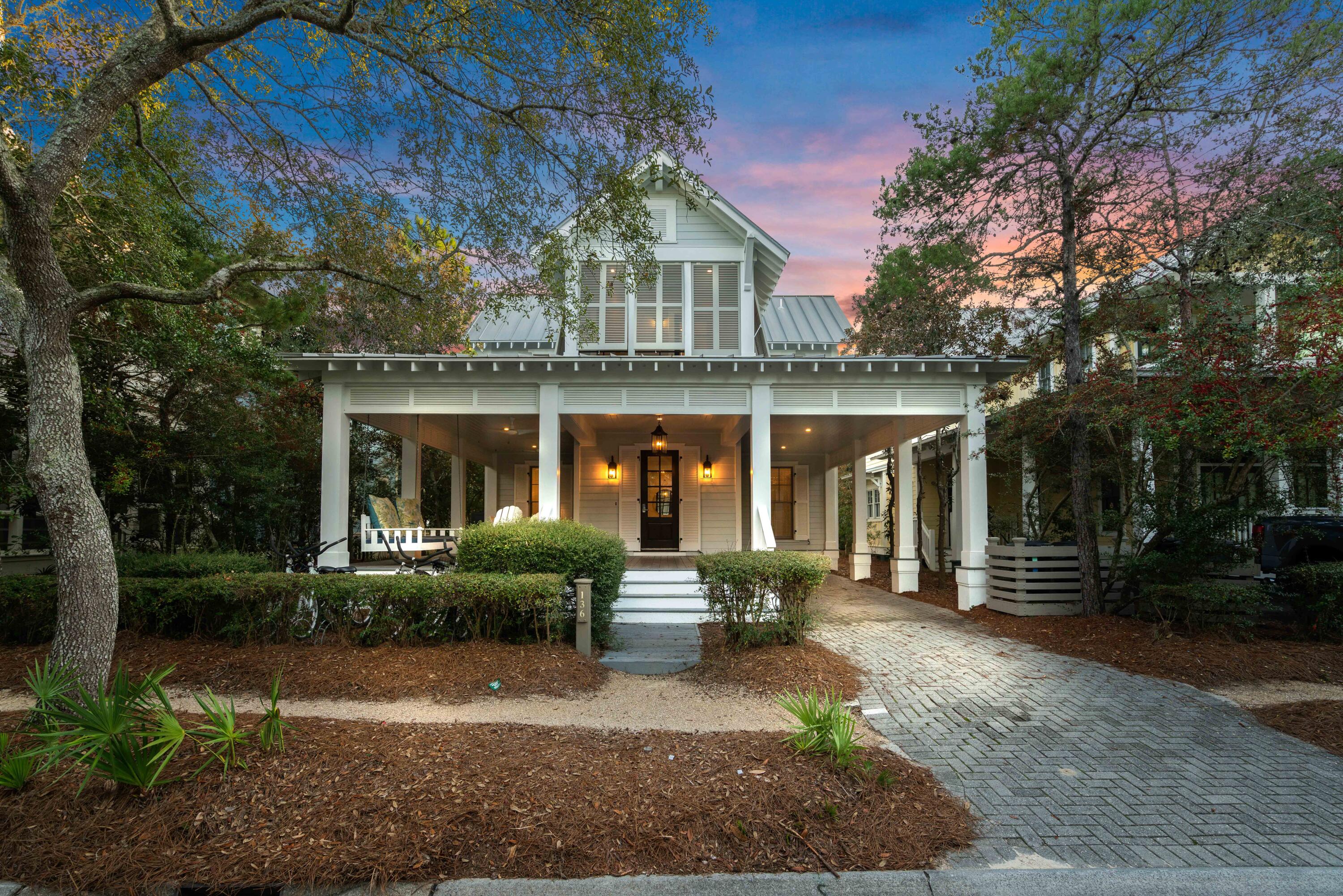 PHASE 1 REMODEL! Steps from 30A and beach clubThis charming, newly remodeled cottage, 136 Silver Laurel, is perfectly situated in the heart of WaterColor, just two blocks from the stunning Gulf-front WaterColor Beach Club and a short stroll from the vibrant village centers of both WaterColor and Seaside.Designed with relaxation and connection in mind, this spacious home features an open-concept floor plan ideal for gatherings of friends and family.  The second floor boasts a gourmet kitchen with granite countertops, stainless steel appliances, and a breakfast bar that opens to a  comfortable living and dining area.  Retreat to the luxurious primary suite, also located on the second floor, and unwind in the king-sized bed after a day of enjoying all that WaterColor has to offer Savor the delightful Florida climate while unwinding on the covered porch of this WaterColor retreat, or take a bike ride over to Seaside. 

Home Highlights:

Situated in WaterColor's Park district
Just 2 blocks from the WaterColor Beach Club
Fully Equipped Gourmet Kitchen
Spacious Covered Porch
Two Dedicated Parking Spaces
Within Walking Distance to the Beach, Shopping, Dining, and Entertainment
WaterColor Community Highlights:

Recognized as the #1 Family Vacation Destination in the U.S.
Expansive 499-Acre Coastal Resort and Residential Community
Bike-friendly Environment
Award-Winning Tennis Facilities
Dining Options by the Beach, Pool, and Lakeside
Close to State Parks and Preserves
Four Swimming Pools
Home Configuration + Sleeping Arrangements:
Sleeps: 12
5 Bedrooms / 3 Full Baths / 1 Half Bath

First Floor:

Guest Bedroom 1: King Bed, Private Bathroom with Shower/Tub Combo, Deck and Patio, Smart TV
Guest Bedroom 2: Queen Bed, Shared Bathroom with Shower, Deck and Patio, Smart TV
Guest Bedroom 3: Queen Bed, Shared Bathroom with Shower, Smart TV
Guest Bedroom 4: Bunk Room with Two Twin/Twin Bunks, Shared Bathroom with Shower, Smart TV
Second Floor:

Guest Bedroom 5: King Bed, Private Bathroom with Shower and Soaking Tub, Balcony, Smart TV