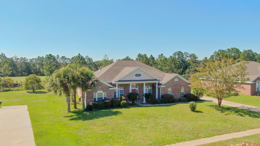 Beautiful 4 bedroom 3 bath home in the gated community of WindSwept Estates. Just repainted inside, all carpet replaced and new back-splash in the kitchen! situated directly on Fairway #3 of a 4 star golf course as rated by Golf Digest. The community is located just a little over 5 miles to the new Publix shopping center in Freeport and roughly 35 minutes from the Northwest Florida Beaches International Airport. Beautiful open floor plan with 12 ft. ceilings in the dining room, living room, master bedroom and foyer, and 11 ft. ceilings in the kitchen and family room. This 4 bedroom 3 bath home has a separate living and dining room. The large family room, custom full wall entertainment center and fireplace. Wainscoting in dining room, custom maple cabinets in the kitchen