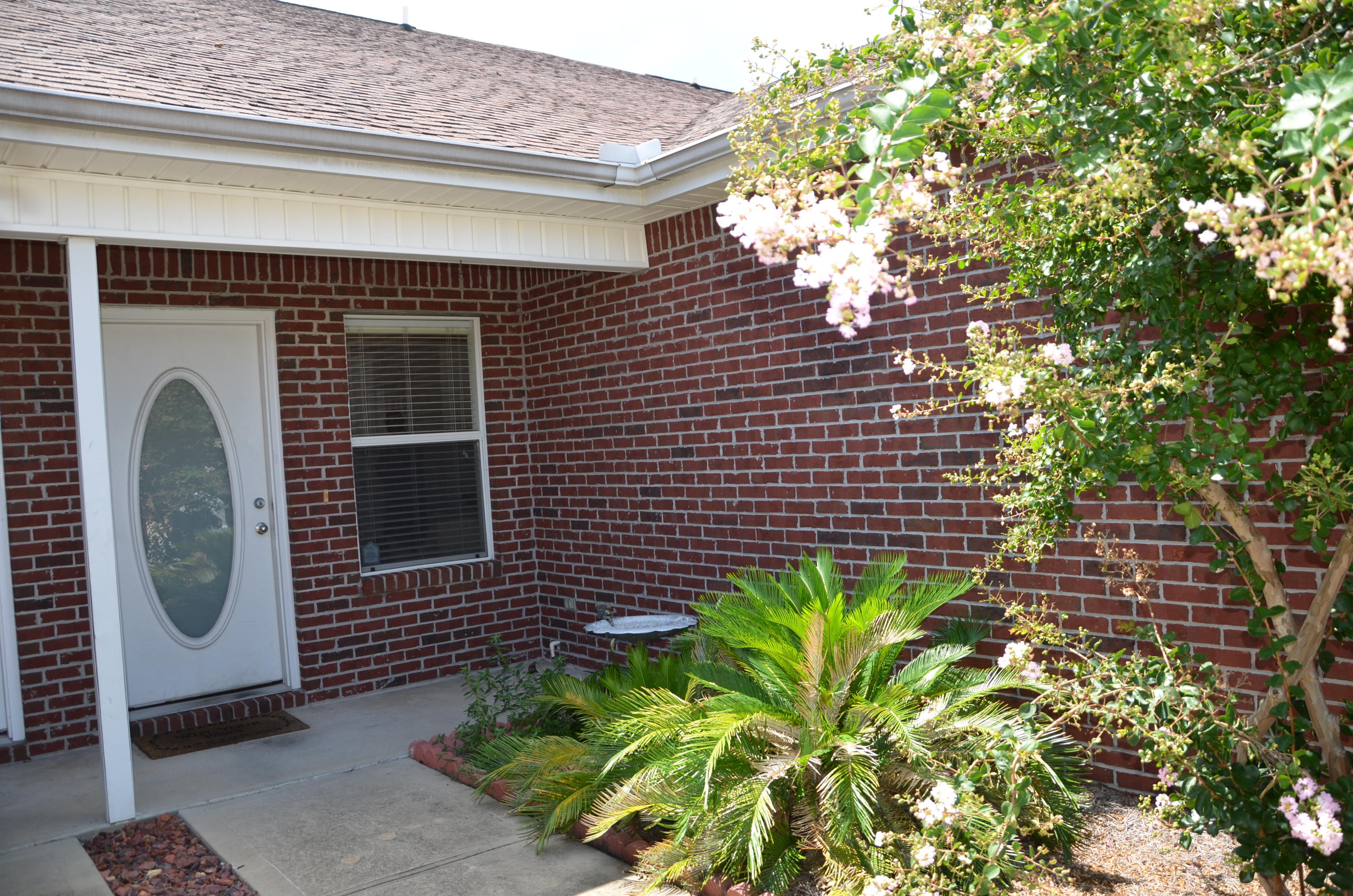 Very clean, well-maintained townhome in the center of town close to everything with a downstairs Master bedroom, two more bedrooms upstairs, and a large, open living room with high, vaulted ceilings. The upgraded kitchen boasts stainless steel appliances, and the living area has gorgeous 16'' tile laid on the diagonal whereas all of the bedrooms have sensible, soft carpeting for bare feet. The stairs are also carpeted and feature a roomy landing. The spacious one-car garage has washer and dryer hook-up plus plenty of room for storage. This towhome has an excellent, clean tenant with a lease that expires May 31 that could be renewed if purchasing as an investment. After that, the lease is being extended for 3 months at a time.