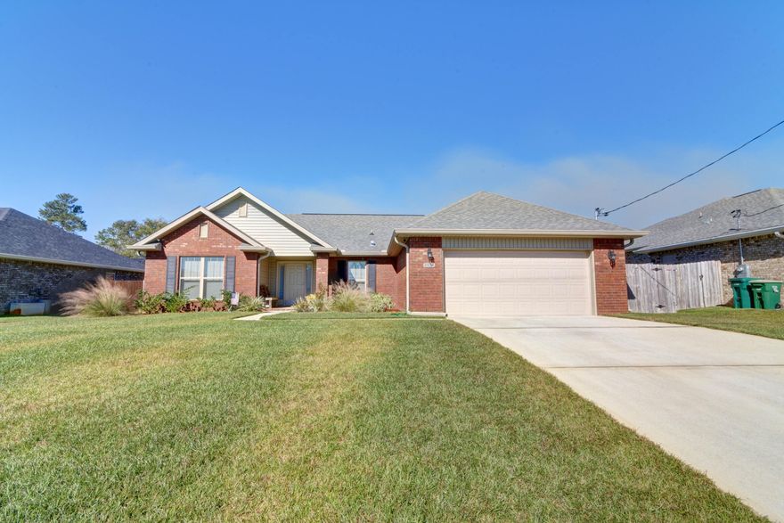 Welcome to this stunning open concept home that features 3 bedrooms, 2 baths, plus an office space on a quarter acre lot in the desirable neighborhood of Holley Hills! Pull up in the long driveway and appreciate the tasteful landscaping, which will lead you to the covered front porch and inside to enjoy soaring 10ft ceilings. Natural sunlight pours through the multiple windows of the spacious living room with hard surface flooring extending throughout (the only carpet is found in the bedrooms), and it's open to the gorgeous and fully updated kitchen. Custom cabinets with granite countertops and stainless appliances are showcased in the kitchen, and you'll love the massive kitchen island with tasteful pendant lighting. The eat in kitchen leads to the back door where you'll find a covered