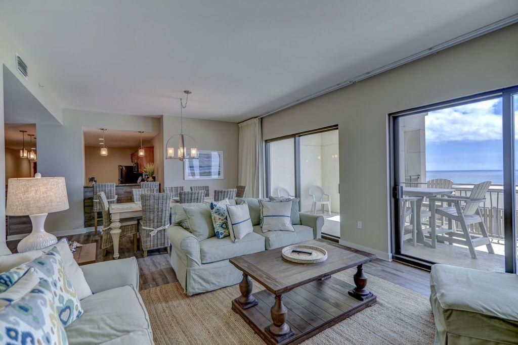 Top floor Penthouse unit with 270 degree views of Beach, Pier Park from three exterior patios and floor to ceiling windows. Very high ceilings and a full recent renovation including new furnishings throughout will impress the most discerning buyer.Owner is a licensed agent in Florida and Georgia.Buyer to verify all room sizes and dimensions.