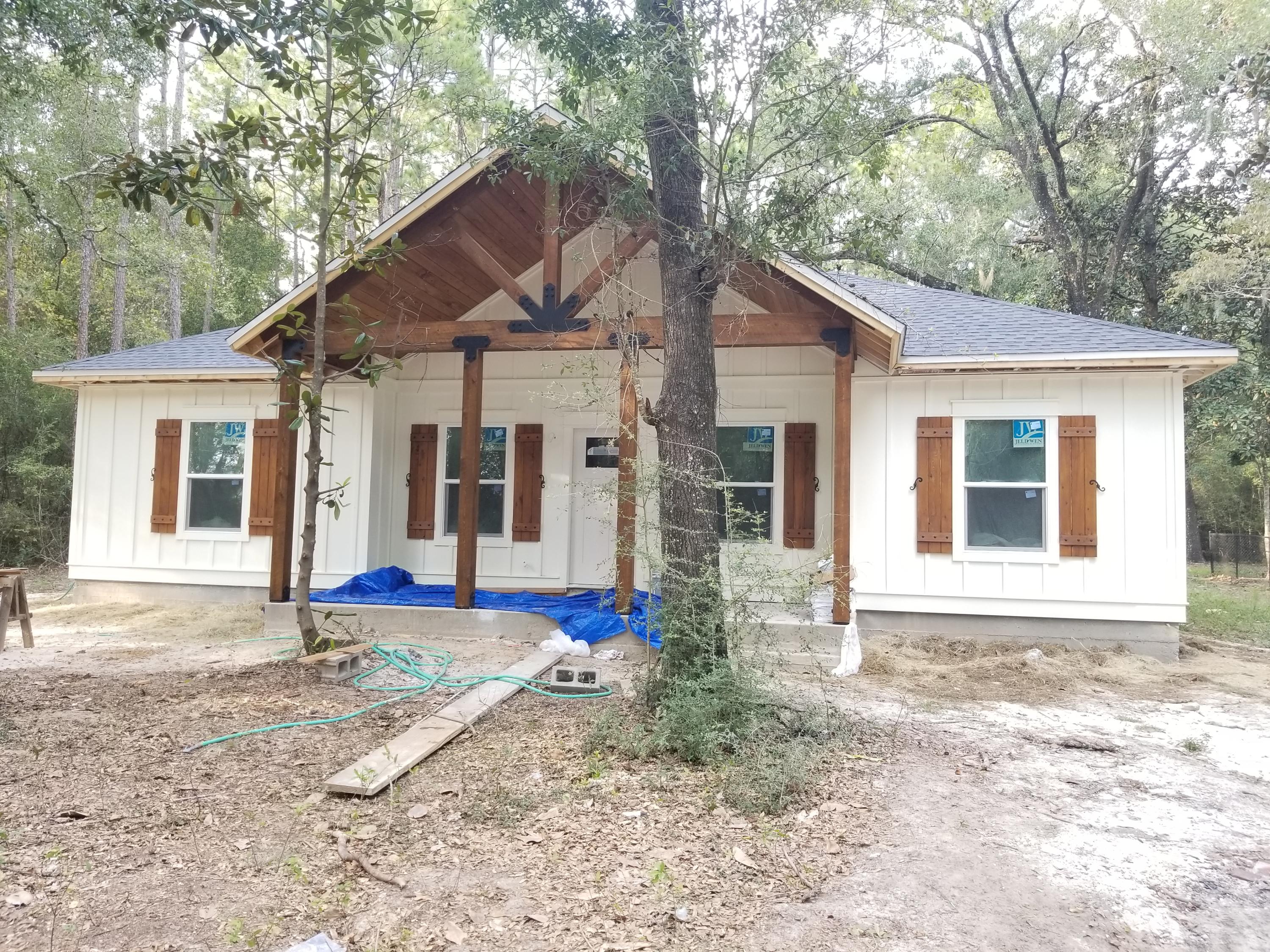 Welcome home!!! Check out this stunning custom craftsman home located just north of DeFuniak Springs, FL just across the way from Juniper Lake. The rustic solid wood exposed beams and cypress porch ceiling make the curb appeal of this home amazing. This 3 bedroom 2 bath, split floor plan allows maximum privacy for the master suite, with the children or guest quietly tucked away on the other side of the home. Situated on .506 of an acre there is plenty of room left to enjoy outside living as well! This home is scheduled to be completed and ready for the new owner to move in just in time for Thanksgiving! Don't wait, CALL TODAY!Buyer to varify all information deemed important.