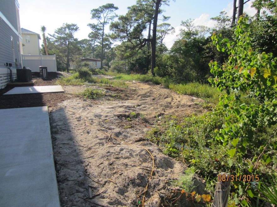 Vacant residential lot approved for construction approximately 950 feet from the Beach walkover at the Santa Clara Access. This access has excellent parking, restrooms, handicapped provisions, and life guards. SEASIDE is approximately one mile to the West. Bike and walking trails all along 30A and quality restaurants and shopping within walking distance of this lot. Approved for building by both DEP and the Corp of Engineers. Permit in hand. Santa Clara Street is paved down to the lot.