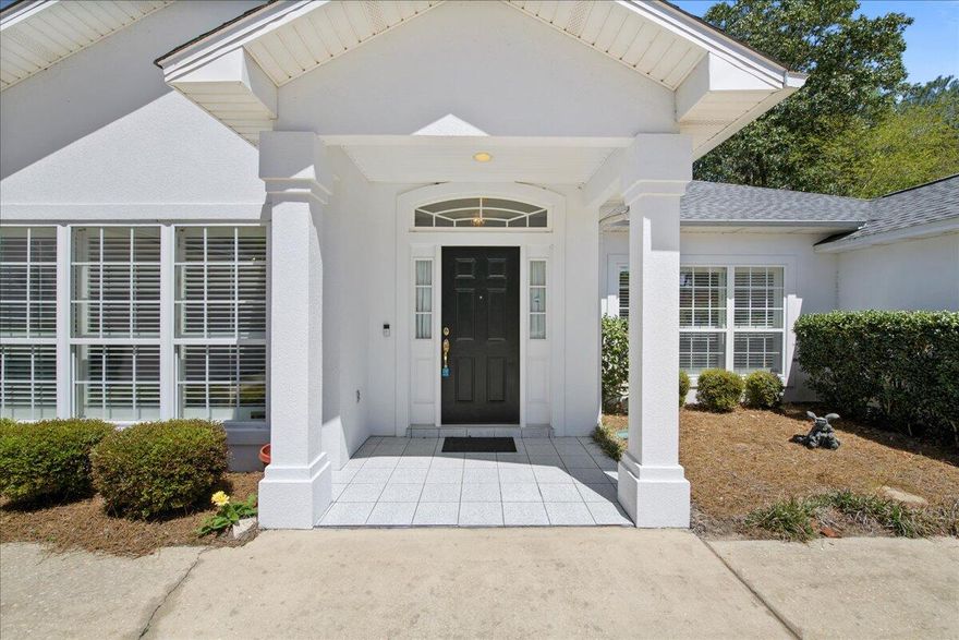 All the bells and whistles were added to this amazing floor plan. Nestled deep within the neighborhood on a stunning lot, the huge half circle drive way welcomes you into the grand foyer of this meticulously maintained home. The 2 car garage is deceiving from the front, on the side is a golf cart entry perfect for storage or a workshop. The amazing light inside will draw you to 2 living spaces, 1 with a wet bar and ice machine and 2 dining spaces. There are 2 bedrooms to the right and 2 bedrooms to the left and 4 FULL bathrooms. The large open concept kitchen has tons of counter space. The master retreat is spacious and includes a giant walk in closet that separates his and hers bathrooms. The laundry room has a sink as well as a refrigerator. You must see for yourself.