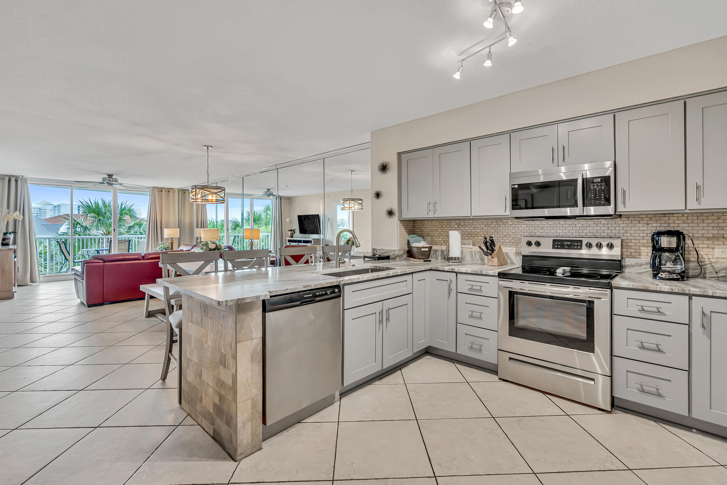 Welcome to your perfect slice of paradise at Terrace at Pelican Beach in the heart of Destin, Florida! This beautifully updated 2-bedroom, 2-bath condo is ideally located on the 2nd floor, offering easy access--no elevator waits required. Step into a freshly remodeled kitchen featuring new cabinets, granite countertops, and stainless-steel appliances--all replaced in 2024, along with a new HVAC system and hot water heater for year-round comfort and efficiency. The unit is carpet-free for a clean, coastal feel throughout. Sold fully furnished! Whether you're looking for a lucrative investment (with a 2024 GRI of $60K), a relaxing second home, or a permanent beachside residence, this condo checks all the boxes. The Terrace is located in one of the most popular vacation complexes on the Emerald Coast. Terrace at Pelican has their own pool and grill area, The owners and guests at the Terrace also have unlimited use to all of Pelican Beach amenities including three pools (indoor & outdoor), an indoor sauna & steam room, gym, tennis, covered parking, conference rooms, game room, caf??, tiki bar, & beach service. The new 114 ft zero entry pool right on the beach with 12 seat spa is absolutely making this resort the optimum vacation destination. This resort is located near Destin's top dining, shopping, and entertainment, this unit offers exceptional value, convenience, and income potential.